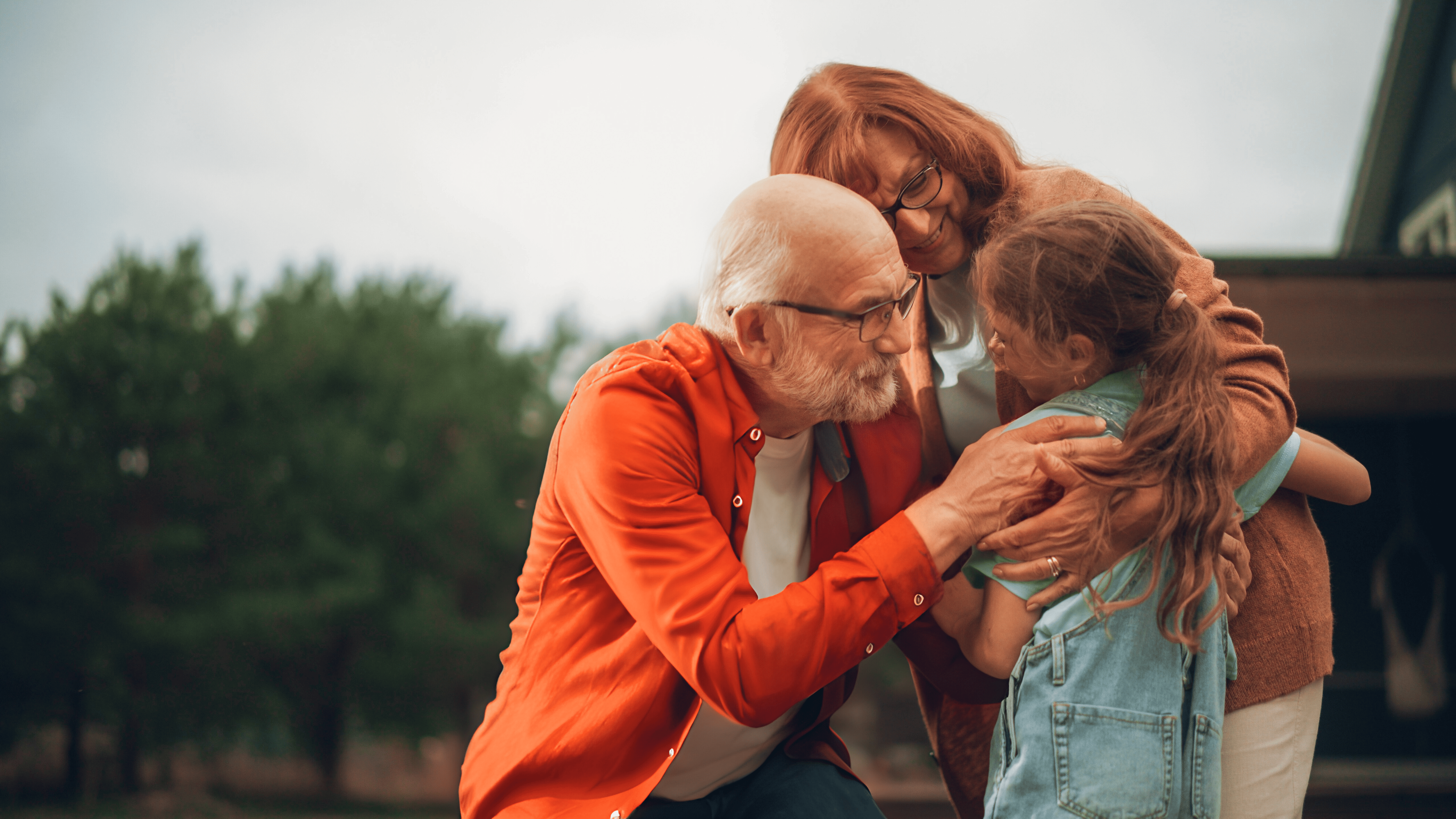 Grandparents_play_with_granddaughter_landscape