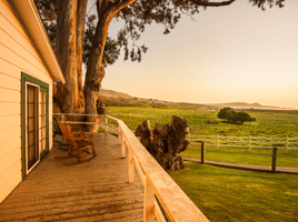 Picture from a porch of a house watching over a farmland
