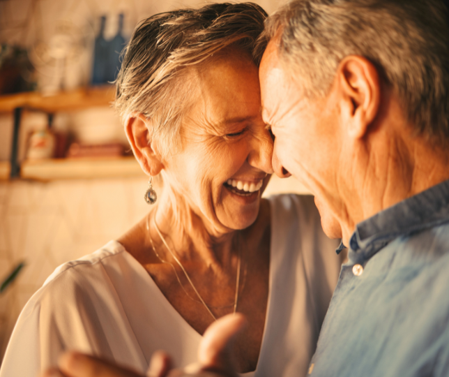 Couple smiling and embracing