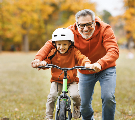 Man_and_boy_with_bike_landscape-1-1-1