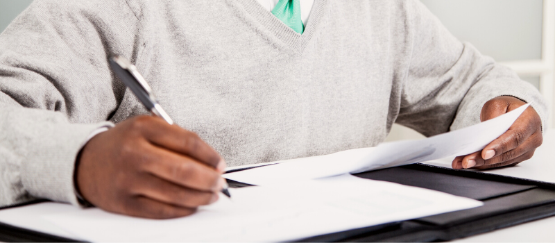 Person singing documents